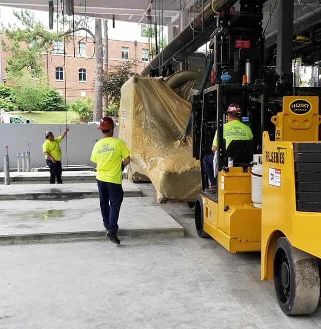 40-60 versalifts with boom attachments and walked chiller onto pads to set into place 40-60 versalifts with boom attachments and walked chiller onto pads to set into place